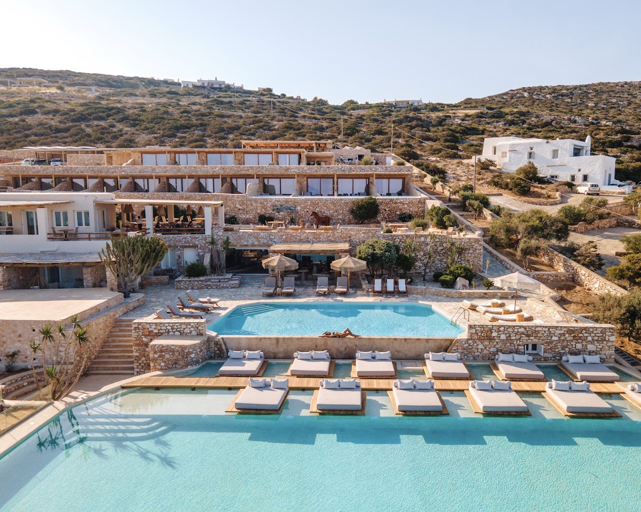 Aerial view of Mythic Paros resort overlooking the Aegean Sea
